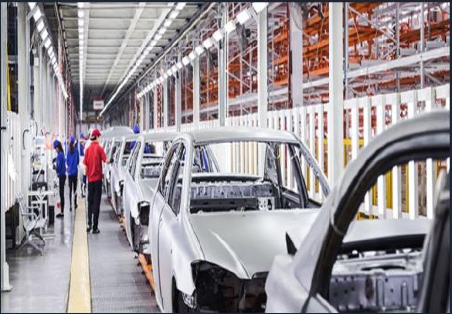 Vehicle assembly line with workers